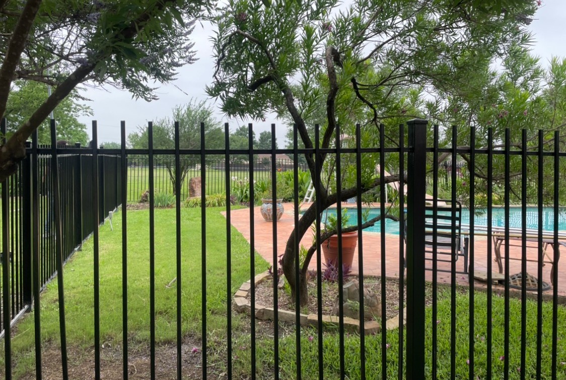 Fence line near pool